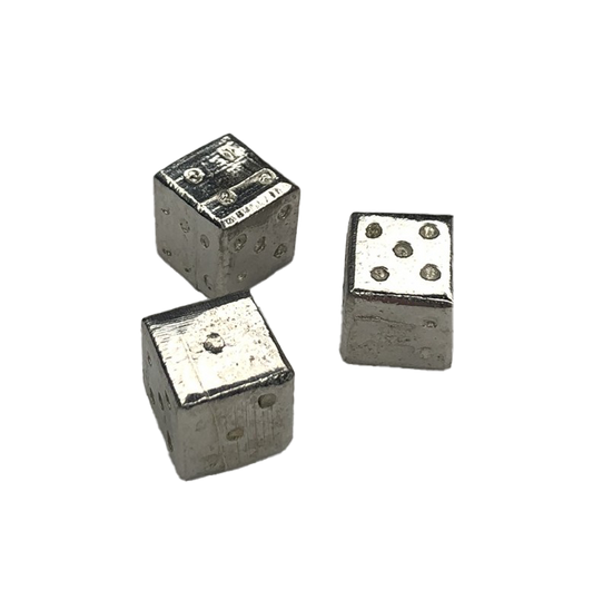 Reproduction lead-free pewter dice like the ones 18th century soldiers were known to make from musket balls